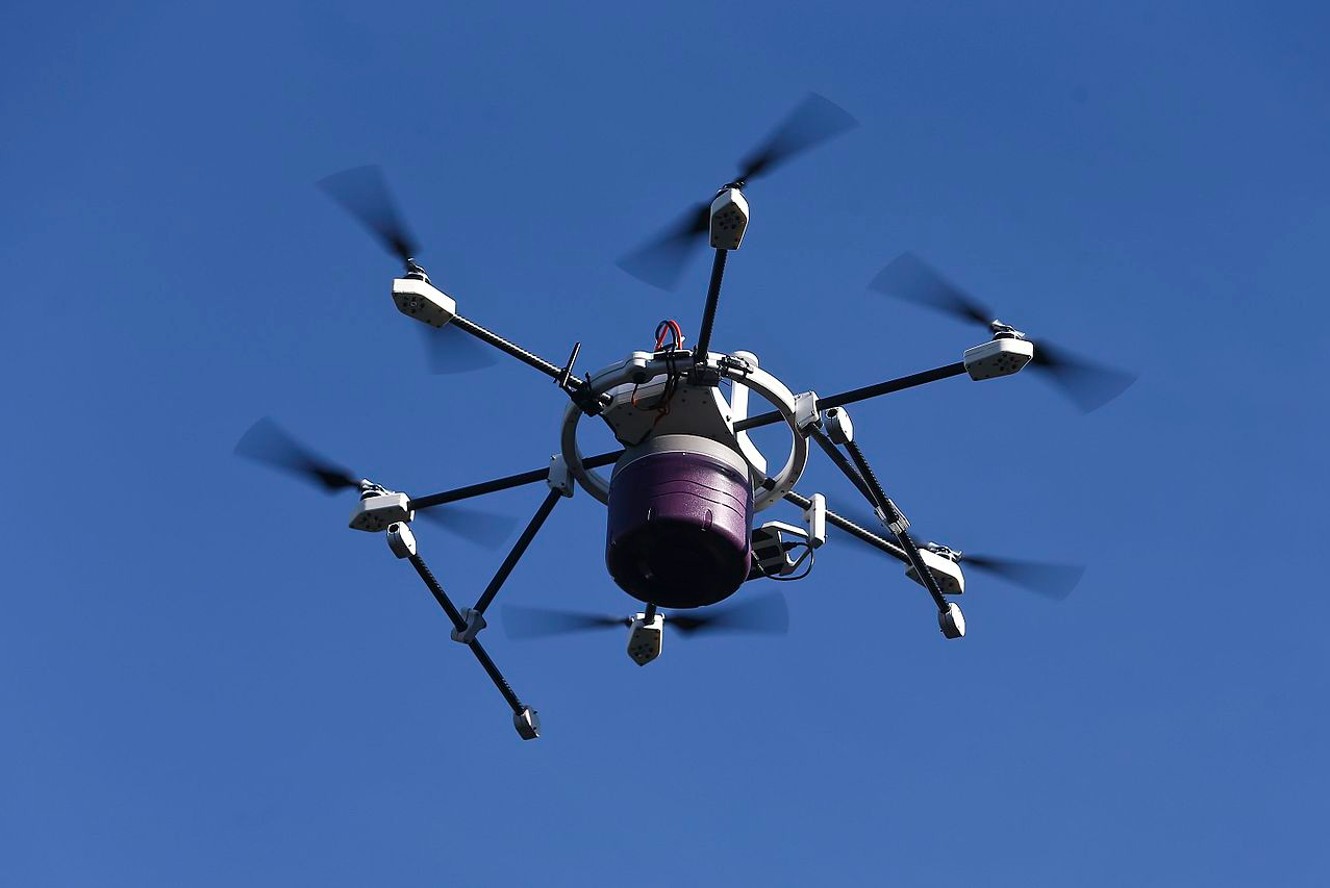 Image of Drone with Cargo Bay attached underneath.